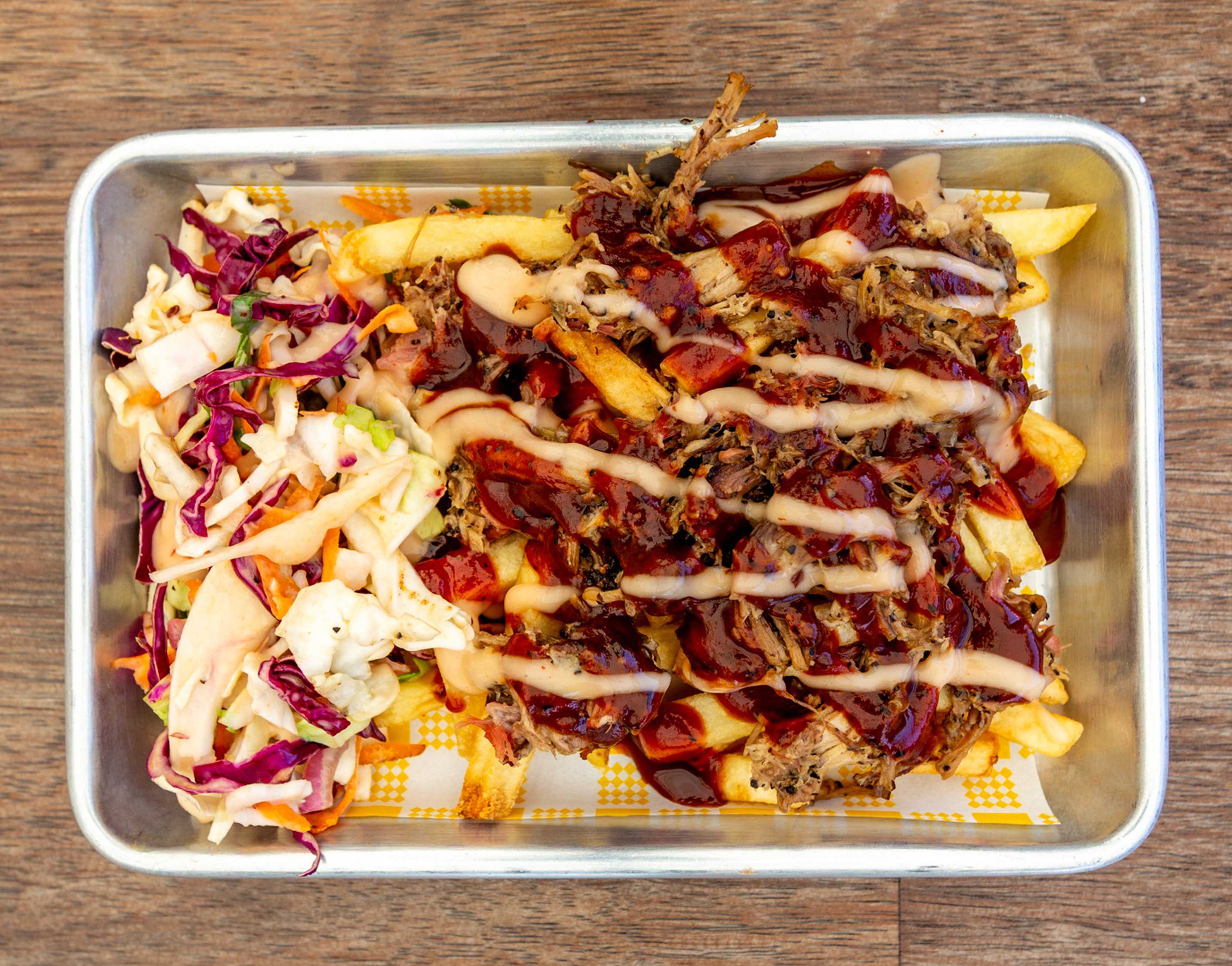 Loaded fries with pulled pork and brisket